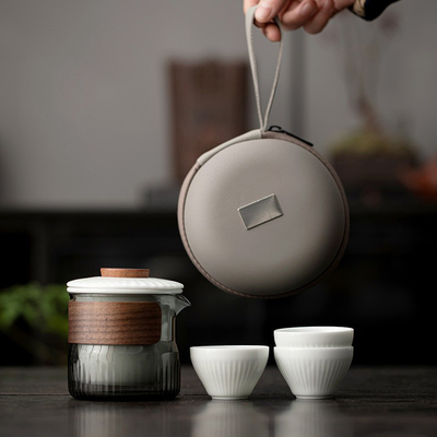 Παρουσίαση Συγκρότημα δώρων Dongli Travel Express Cup Set Portable Round Bag One Pot Three Cup Business Tea Set Gift