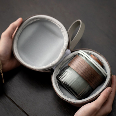 Παρουσίαση Συγκρότημα δώρων Dongli Travel Express Cup Set Portable Round Bag One Pot Three Cup Business Tea Set Gift